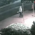 A dark, blurry security camera screenshot labeled "CAPITOL" with a timestamp of 8:14:21 p.m. and the location "am First St SE," noting the video has no sound.