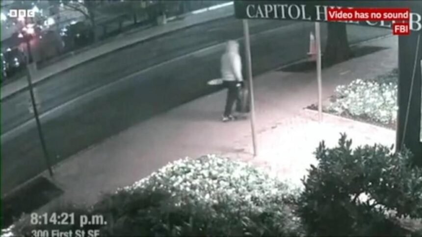 A dark, blurry security camera screenshot labeled "CAPITOL" with a timestamp of 8:14:21 p.m. and the location "am First St SE," noting the video has no sound.