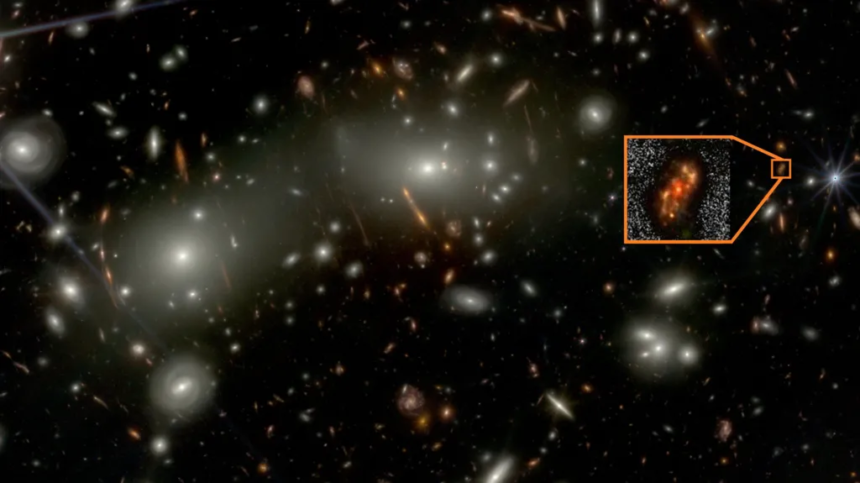 A deep space field image featuring countless galaxies, with a highlighted box showing a magnified, red, and irregularly shaped galaxy.