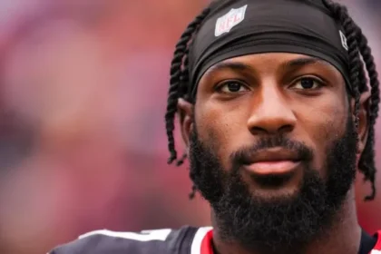 Close-up of an NFL player looking focused on the field