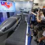 China sanctions 20 U.S. defense firms and 10 executives after a $10B arms sale to Taiwan, heightening tensions between the two nations.