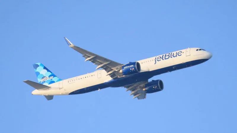 JetBlue passenger aircraft flying at cruising altitude amid safety concerns following a near midair collision with a US Air Force tanker near Venezuelan airspace