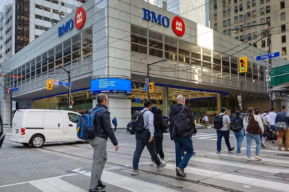 Aerial view of downtown Toronto with Canadian flag overlay, representing population decline and immigration changes in Canada