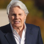 Elderly man walking outdoors as court competency ruling draws public attention.