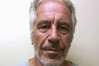 Jeffrey Epstein pictured in a mugshot-style photo as new grand jury records are set for public release