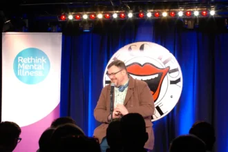 In the UK, new schemes to support mental health are introducing to people an unexpected skill: stand-up comedy.