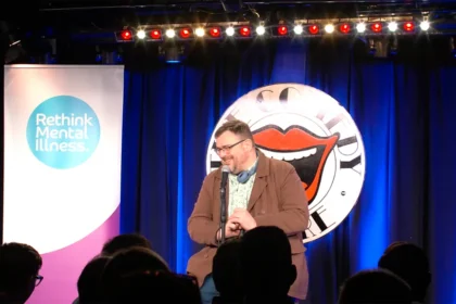 In the UK, new schemes to support mental health are introducing to people an unexpected skill: stand-up comedy.