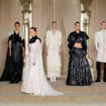 Models walk the runway during Paris Couture season as leading fashion houses present January collections