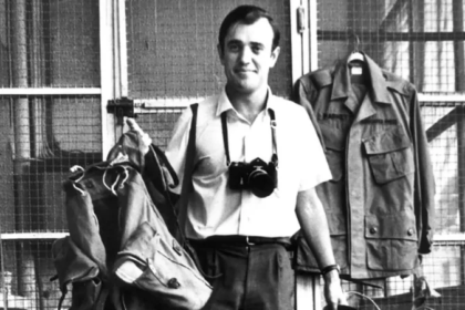 Peter Arnett, Pulitzer Prize winning war correspondent, during field reporting in a conflict zone