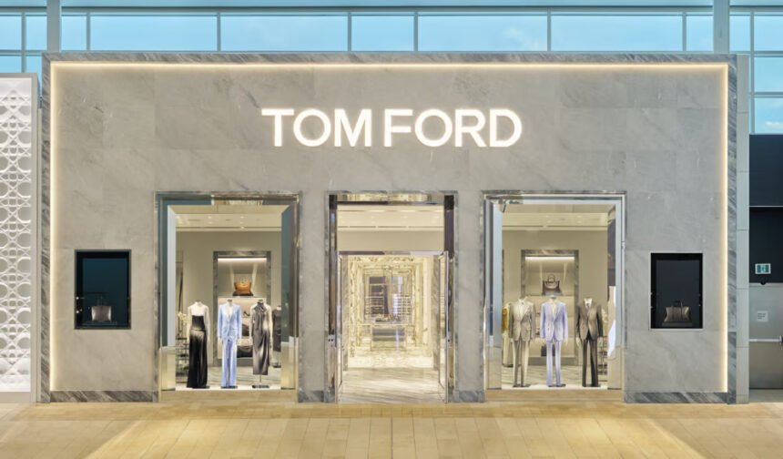 Interior view of Tom Ford luxury boutique at Yorkdale Shopping Centre in Toronto, showcasing elegant displays, marble and ebony accents, and luxury fashion collections for men and women