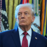 President Donald Trump signing documents while rejecting bipartisan bills on Colorado water funding and Florida tribe flood mitigation