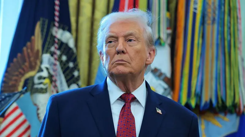 President Donald Trump signing documents while rejecting bipartisan bills on Colorado water funding and Florida tribe flood mitigation