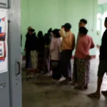 At least 170 civilians lost their lives in military air strikes during Myanmar’s recent election period, according to the United Nations. The UN said these attacks happened while the country carried out a tightly controlled vote that many nations and rights groups have already rejected. The UN human rights office confirmed that credible sources recorded these deaths between December 2025 and late January. During the same period, the military launched at least 408 aerial attacks across the country. Election Held Amid Ongoing Civil War Myanmar remains trapped in a civil war that began after the military seized power in 2021. The coup removed the democratically elected leader Aung San Suu Kyi, who remains imprisoned. Large areas of the country could not take part in the election because of ongoing fighting and insecurity. The military organized the vote in three phases, with the final round held last week. State media announced that the military backed Union and Solidarity Party won an overwhelming victory. Many observers expected this outcome due to strict controls on the voting process. Opposition Parties Barred From Voting Authorities blocked the National League for Democracy from contesting the election. The party had won landslide victories in both elections before the coup. Several opposition candidates and ethnic groups also faced exclusion. Human rights organizations believe the military plans to use proxy political parties to maintain its grip on power. UN Calls Election Staged and Fear Driven UN human rights chief Volker Turk strongly criticized the vote. He described the election as staged by the military and said it failed to meet basic democratic standards. Turk explained that fear shaped many voting decisions. People either voted or stayed home because they feared the consequences. He said this reality directly violated internationally protected civil and political rights. Air Strike Death Toll Likely Higher James Rodehaver, who leads the UN Human Rights Myanmar team, said the civilian death toll may rise. He explained that communication blackouts and fear prevent many people from reporting attacks. The UN gathered the data from open sources during the campaign period through the final voting day. Rodehaver warned that the current figures likely remain incomplete. Despite the election, violence continues across much of Myanmar. Air strikes and armed clashes show no signs of slowing, leaving civilians at constant risk.