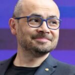 DeepMind CEO Hassabis questions OpenAI’s move to put ads in ChatGPT, emphasizing trust and careful AI design