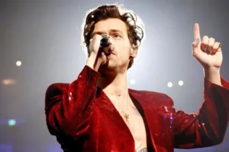 Pop superstar Harry Styles is helping struggling music venues across the UK. For his 2026 Together Together tour, he will donate £1 from every ticket sold to small venues, aiming to raise approximately £780,000 for the LIVE Trust. Tour Details and High Demand The tour includes seven cities, with six nights at London’s Wembley Stadium. Following huge demand, Styles added two extra shows. Fans are eagerly queuing for pre-sale tickets, which range from £44.10 to £466.25, with a £2.95 handling fee per order. This pricing is higher than his 2023 Wembley shows, reflecting the rising cost of stadium events. In New York, Styles will perform 30 nights at Madison Square Garden. Despite ticket prices, the tour remains one of the most anticipated music events of the year. His shows coincide with the release of his fourth album, Kiss All The Time, Disco Occasionally, on 6 March. Supporting Grassroots Music Styles is following in the footsteps of artists like Coldplay, Ed Sheeran, Lorde, and Radiohead, who have also contributed to small music venues. The LIVE Trust works to protect grassroots venues that are struggling financially. Recent reports show that over half of UK small venues fail to make a profit, and since 2023, more than 150 have permanently closed. "I wouldn’t be where I am today without the gigs I played around the North East and beyond when I was starting out," Styles said. "These venues are legendary, but they are struggling." The Music Venue Trust praised Styles’ contribution, noting that even a £1 levy per ticket can provide long-term support for the live music ecosystem. Culture Minister Ian Murray has expressed support for the initiative, aiming for at least 50% of stadium and arena tickets in 2026 to adopt a similar levy. Levy Impact and Future Plans Although no funds have been distributed yet, the first phase of funding will soon be announced. Beneficiaries will include venues, artists, and independent promoters. Last year, 8.8% of tickets for UK arena and stadium shows included a version of this "grassroots levy," which continues to grow in popularity. Styles’ Upcoming Highlights Alongside his tour, Styles will present at the Grammy Awards this weekend in Los Angeles. He won Album of the Year at the 2023 ceremony for his third record, Harry’s House. Fans have expressed mixed reactions to ticket prices, with some noting that top-tier seats now cost £140 more than last time. Despite this, the focus remains on Styles’ efforts to give back to the music community that supported his early career.