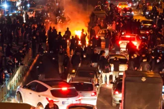 Iran gives young protesters three days to surrender for leniency after unrest, as state TV is briefly hacked by opposition forces.