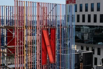 Netflix’s ad-supported plan grows, boosting revenue and subscribers while narrowing the gap with its standard no-ads tier.