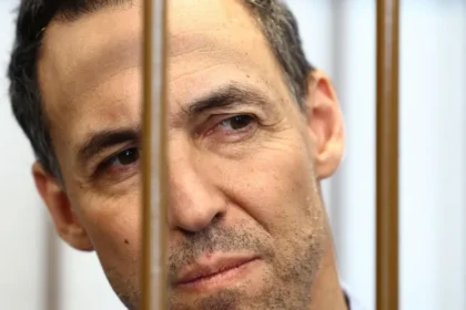 French researcher Laurent Vinatier is freed from Russia in a prisoner swap with Russian basketball player Daniil Kasatkin.