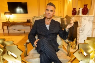 Robbie Williams Breaks The Beatles’ UK Number One Album Record