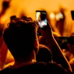 Should smartphones be locked away at gigs and in schools