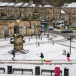 Tens of thousands without power as snow and ice warnings cover most of UK