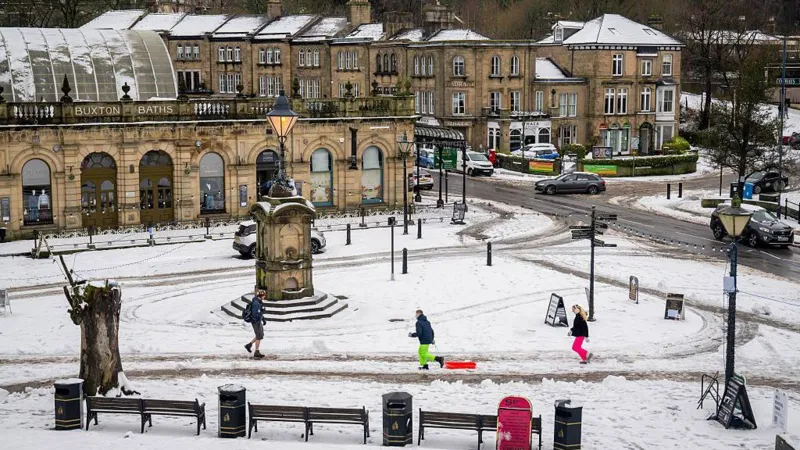 Tens of thousands without power as snow and ice warnings cover most of UK