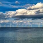 The UK secures a record 8.4GW offshore wind auction, cutting energy costs, creating jobs, and strengthening clean power targets by 2030.