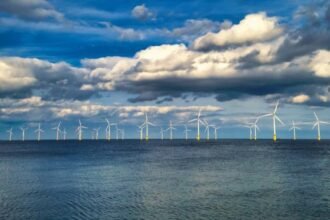 The UK secures a record 8.4GW offshore wind auction, cutting energy costs, creating jobs, and strengthening clean power targets by 2030.