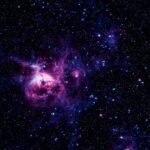 Research shows dark matter may have started extremely hot, moving near light speed, then cooled before galaxies formed in the early Universe.