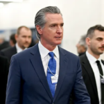 Treasury Secretary Scott Bessent speaking at Davos while criticizing California Governor Gavin Newsom