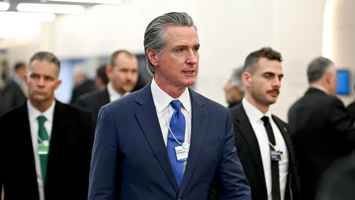 Treasury Secretary Scott Bessent speaking at Davos while criticizing California Governor Gavin Newsom