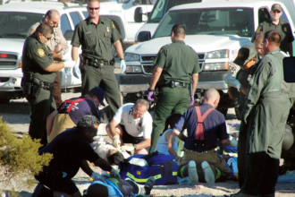 Emergency responders transport a critically injured individual after a Border Patrol shooting in Arizona