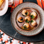 Empty tables in a traditional French bistro reflecting declining business