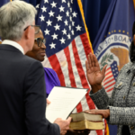 Federal Reserve Governor Lisa Cook speaking at an economic forum