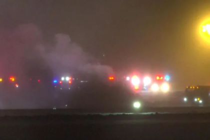 Private jet crash at Bangor International Airport with emergency crews responding amid snow
