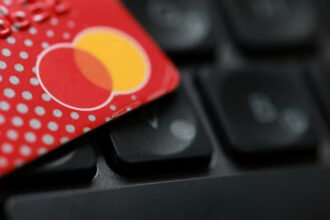 Mastercard profit exceeds expectations as the company announces 4% global layoffs and reports strong Q4 spending