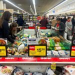 Shoppers react as US consumer confidence falls to an 11 year low