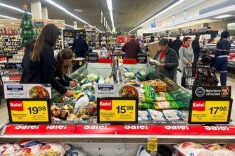 Shoppers react as US consumer confidence falls to an 11 year low