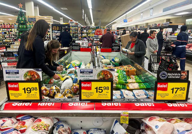 Shoppers react as US consumer confidence falls to an 11 year low