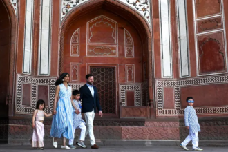 Usha Vance and Vice President JD Vance smiling together as they announce their fourth child