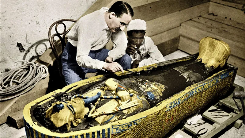 A Gasp of Wonder: Howard Carter Unearths Tutankhamun’s Tomb On 12 February 1923, Howard Carter and his team finally revealed Tutankhamun’s sarcophagus after decades of careful excavation. “A gasp of wonderment escaped our lips,” Carter said, recalling the breathtaking sight of the golden coffin and its intricate treasures. Thirty-three centuries had passed since anyone last walked inside the tomb, yet signs of life, like a half-filled bowl of mortar and scattered wood chips, made it feel almost alive. Carter described entering a golden shrine, sealed and untouched, then opening a second, even more stunning shrine that held an immense yellow quartzite sarcophagus. Howard Carter: From Draughtsman to Archaeologist Despite leaving school at 15, Carter’s talent for drawing led him to Egypt. At 17, he began working as a draughtsman and tracer, learning on the job during Egypt’s archaeological boom. Decades of experience and careful persistence in the Valley of the Kings finally led to his greatest success: uncovering Tutankhamun’s nearly intact tomb, hidden under centuries of debris. The Moment That Sparked Egyptomania In November 1922, Carter peered through a small hole in the tomb’s door. His patron, Lord Carnarvon, anxiously asked if he could see anything. Carter famously replied, “Yes, wonderful things.” Inside, gold glimmered everywhere—strange statues, animals, and artifacts designed to accompany the young pharaoh into the afterlife. Tutankhamun was only about 17 at his death, having inherited the throne at eight or nine. The exact cause of his death remains uncertain, with theories ranging from a hunting accident to assassination. Global Fame and the Curse Myth Carter’s discovery of the antechamber in 1922 was just the start. It took 15 more months to reach the sarcophagus and reveal the boy king’s treasures. Newspapers around the world reported the sensational find, and the world’s fascination with ancient Egypt grew. Fashion, art, films, and music were all influenced by Tutankhamun’s golden age. Tragedy soon followed when Lord Carnarvon died of blood poisoning from an insect bite. Stories of a curse surrounding Tutankhamun fueled myths and heightened public interest, turning Carter and Carnarvon into international celebrities. The discovery of Tutankhamun’s tomb remains one of the most significant archaeological achievements in history, revealing not just treasures but also a deep connection to Egypt’s ancient past.