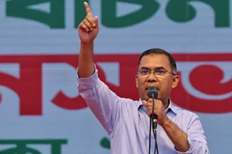 Bangladesh Nationalist Party Wins Big in First Election Since Gen Z Protests The Bangladesh Nationalist Party (BNP) has secured a sweeping victory in the country's first general election since the 2024 Gen Z-led protests that ousted Prime Minister Sheikh Hasina. The center-right party won more than two-thirds of the parliamentary seats, while the Islamist party Jamaat came in second. Hasina’s Awami League was barred from participating. Tarique Rahman Set to Become Prime Minister BNP leader Tarique Rahman is expected to take office as Bangladesh’s next prime minister. In his first speech to supporters in Dhaka, he expressed gratitude, urging citizens to attend prayers instead of street celebrations in memory of his late mother, former PM Khaleda Zia, who passed away in December. Rahman spent 17 years in self-imposed exile in London before returning five days before his mother’s death. This will also be his first time serving as a member of parliament. He was elected from the Dhaka-17 and Bogra-6 constituencies. Overall, 212 BNP candidates won seats, according to the Election Commission, with voter turnout at 59.44%. Historic Election Changes This election marked several firsts. With the Awami League banned, Jamaat emerged as one of the main parties competing for power. The student-led National Citizen Party (NCP), born from the 2024 protests, won six seats within Jamaat’s alliance. The absence of both Sheikh Hasina and Khaleda Zia, who dominated politics for decades, also highlighted a shift in Bangladesh’s political landscape. The Awami League has questioned the election’s legitimacy, while Jamaat raised concerns about voting irregularities. Both parties accused each other of misconduct during the election process. Key Challenges for the New Government Rahman faces significant hurdles. Restoring democracy, reviving the economy, controlling rising food prices, and creating jobs for the country’s large youth population are top priorities. Additionally, repairing strained relations with neighboring India will be crucial. India’s Prime Minister Narendra Modi quickly congratulated Rahman, calling his win a “remarkable victory” and affirming India’s commitment to peace, progress, and prosperity for both nations. A Mixed Legacy Although BNP promises change, the party faces scrutiny over past corruption allegations and human rights violations during its previous tenure in the early 2000s. Analysts note that Rahman’s leadership style and ability to deliver reforms will be closely watched both domestically