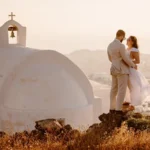 Where to Elope in 2026: Why Couples Are Choosing Intimate Destination Weddings Elopements Are Redefining Modern Weddings Elopements are no longer secret ceremonies. In 2026, they are stylish, intentional, and often set in breathtaking destinations. More couples now choose private ceremonies over traditional weddings. Instead of large guest lists and formal venues, they travel to remote locations and exchange vows in peace. These celebrations feel personal and meaningful, not performative. A Real Couple, A Personal Choice When Zanthe and Mark Howell got engaged in 2024, they already knew what their wedding would look like. They planned to marry in the Scottish Highlands. No guests. No spotlight. Just the two of them. Zanthe says they never felt comfortable being the center of attention. A big wedding did not reflect who they were. For them, traveling somewhere remote felt symbolic. It marked the start of their shared life in a quiet and powerful way. Their story reflects a growing trend. Many couples now choose intimacy over tradition. Why Elopements Are Rising in 2026 Several factors drive this shift. First, wedding costs continue to climb. In 2026, the average wedding in the UK costs around £21,000. In the United States, couples spend about $36,000. Those numbers push many couples to reconsider. By comparison, a destination elopement typically costs between $2,500 and $8,000. That price range makes it far more accessible. Couples can invest in travel, photography, and a memorable experience instead of a single large event. Second, family expectations often add pressure. Some couples want freedom from complicated planning and outside opinions. Eloping allows them to focus on their relationship, not logistics. Third, many couples value experiences over tradition. They prefer adventure, travel, and meaningful moments. A ceremony in the mountains, by the sea, or in a quiet forest feels more authentic to them. Stunning Remote Locations Take Center Stage Today’s elopements take place in dramatic settings. Think rugged coastlines, wild highlands, desert landscapes, or hidden islands. These backdrops create unforgettable memories without the need for elaborate décor. Couples now treat their wedding as a shared adventure. They hike together. They explore new cultures. They celebrate in places that feel special to them. Instead of planning for hundreds of guests, they focus on each other. A Chic and Intentional Way to Marry Modern elopements are not rushed decisions. Couples plan them carefully. They hire photographers, choose meaningful outfits, and design ceremonies that reflect their values. What once felt secret now feels empowering. In 2026, eloping represents freedom, financial sense, and emotional clarity. It allows couples to begin marriage on their own terms.