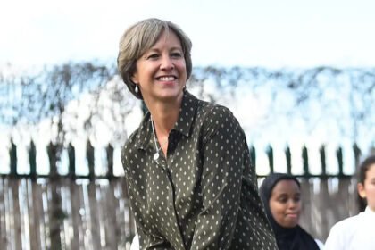 New Surveillance Footage Released The FBI has shared images of a masked individual in connection with the disappearance of news anchor Savannah Guthrie’s mother, Nancy Guthrie. Authorities say the person was armed and may have tampered with Nancy’s home security camera. FBI Director Kash Patel said investigators recently recovered footage that had been inaccessible due to damaged or removed recording devices. The videos show the suspect approaching the front door, checking the camera, and covering it with vegetation. Family Urges Public Help Savannah Guthrie shared the footage on Instagram, appealing to anyone who might recognize the suspect. “We believe she is still out there,” Savannah said. “Bring her home.” This marks the first significant development in the case, which has drawn national attention since Nancy, 84, went missing from her Tucson, Arizona, home on January 31. Timeline and Evidence Authorities found that the home’s doorbell camera was disconnected at 1:47 a.m., with motion detected at 2:12 a.m. Around 2:28 a.m., Nancy’s pacemaker app lost connection. Blood found on her porch tested positive as hers. The FBI has also offered a $50,000 reward for information leading to her safe return. Ransom Notes and Investigations Officials are taking a recent ransom email seriously, which included a Monday deadline. Previous ransom demands were in Bitcoin, and one hoax note led to an arrest last week. Nancy’s family has said they are willing to pay for her safe return. White House Press Secretary Karoline Leavitt confirmed that President Donald Trump has reviewed the footage and urged anyone with information to contact authorities. Public Response The case has prompted widespread concern and social media appeals. Savannah continues to share updates, asking the public for help in identifying the suspect and ensuring her mother’s safety.