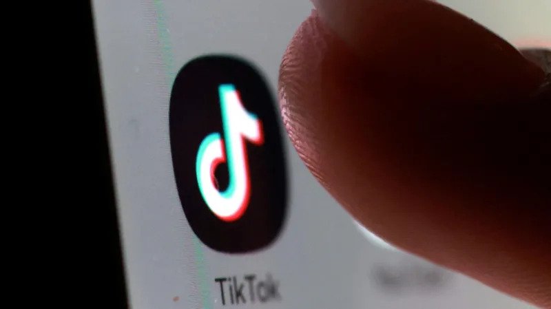 TikTok Account Posts Inappropriate Deepfake Content Authorities are investigating a TikTok account that shared inappropriate deepfake videos featuring staff from Grainville School. The account used the school’s badge and branding in five uploaded videos, some of which included staff members. The account has been removed from TikTok after reports were filed with both the platform and the States of Jersey Police. Grainville School has been contacted for comment, and officials are monitoring the situation closely. What Are Deepfakes? Deepfakes are videos, images, or audio clips created using artificial intelligence to appear real. These manipulated media clips can be misleading or harmful if shared publicly. Officials Urge Caution Deputy Rob Ward, the Education and Lifelong Learning Minister, advised people not to watch, share, or engage with the content. He stated that circulating fake accounts or media coverage may give these harmful materials more attention and encourage similar behavior. “Our priority is removing the content quickly, supporting the staff affected, and reinforcing safeguarding measures,” Ward said. Incident Appears Isolated At this stage, authorities believe the incident is isolated, but they continue to monitor all schools in Jersey. Ward emphasized the importance of protecting school communities from impersonation attempts or harmful media.