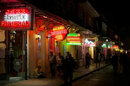 Explore the Heart of New Orleans’ Live Music Scene New Orleans, famously called the Big Easy, is more than Mardi Gras. Its lively neighborhoods along the Mississippi River host music all year, from jazz and blues to zydeco and the city-born Bounce hip-hop style. The city’s vibrant music culture makes it a must-visit for live music fans. We asked NOLA-based singer-songwriter Andrew Duhon to share his favorite spots. “This isn’t just any city,” he says. “Every corner tells a story. Each French-style door opens into a courtyard full of life and history.” Duhon, who tours the U.S. with his folk and blues trio, prefers venues that truly feel like New Orleans. “At BJ’s in the Bywater, you can chat with locals. Half of them you know, the rest you’ll be friends with in minutes. And the music inside is unforgettable,” he explains. Tipitina’s: A Legendary Spot for Big Acts When it comes to large venues hosting national performers, Tipitina’s stands out. Opened in 1977, this Uptown juke joint is named after a classic song by Professor Longhair, a New Orleans piano icon. Tipitina’s features a mix of local and touring acts. From Bounce star Big Freedia to Mardi Gras shows, it’s always buzzing with energy. “Tipitina’s has a special New Orleans feel,” Duhon says. “It’s not sterile. The room and the music are alive with the city’s spirit.” A City That Inspires Musicians For Duhon, New Orleans itself shapes creativity. “Walking into a venue here gives you a sense of history and welcome,” he says. “That feeling is unique. Every musician in NOLA carries a bit of that energy.” Whether it’s a candlelit piano bar or a lively juke joint, these venues make New Orleans unforgettable for music lovers.
