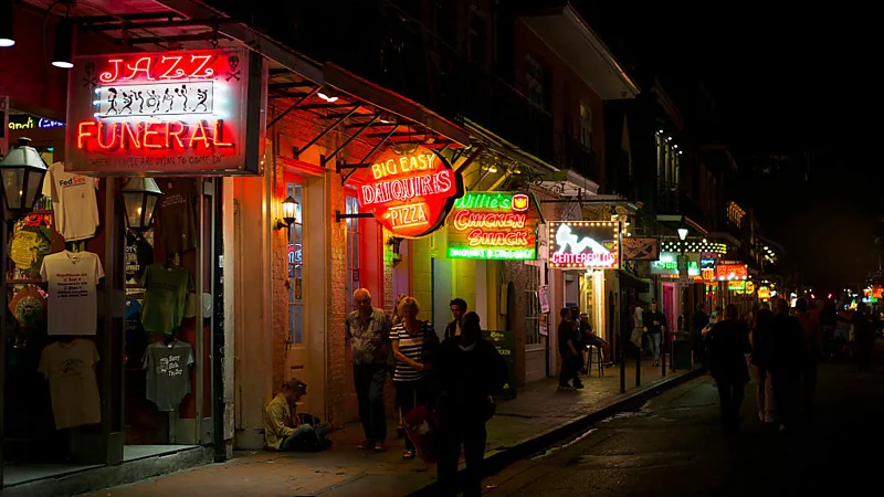 Explore the Heart of New Orleans’ Live Music Scene New Orleans, famously called the Big Easy, is more than Mardi Gras. Its lively neighborhoods along the Mississippi River host music all year, from jazz and blues to zydeco and the city-born Bounce hip-hop style. The city’s vibrant music culture makes it a must-visit for live music fans. We asked NOLA-based singer-songwriter Andrew Duhon to share his favorite spots. “This isn’t just any city,” he says. “Every corner tells a story. Each French-style door opens into a courtyard full of life and history.” Duhon, who tours the U.S. with his folk and blues trio, prefers venues that truly feel like New Orleans. “At BJ’s in the Bywater, you can chat with locals. Half of them you know, the rest you’ll be friends with in minutes. And the music inside is unforgettable,” he explains. Tipitina’s: A Legendary Spot for Big Acts When it comes to large venues hosting national performers, Tipitina’s stands out. Opened in 1977, this Uptown juke joint is named after a classic song by Professor Longhair, a New Orleans piano icon. Tipitina’s features a mix of local and touring acts. From Bounce star Big Freedia to Mardi Gras shows, it’s always buzzing with energy. “Tipitina’s has a special New Orleans feel,” Duhon says. “It’s not sterile. The room and the music are alive with the city’s spirit.” A City That Inspires Musicians For Duhon, New Orleans itself shapes creativity. “Walking into a venue here gives you a sense of history and welcome,” he says. “That feeling is unique. Every musician in NOLA carries a bit of that energy.” Whether it’s a candlelit piano bar or a lively juke joint, these venues make New Orleans unforgettable for music lovers.