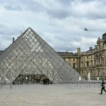 Louvre Water Leak Damages 19th Century Painting in Paris Museum A water leak at the Louvre Museum in Paris has caused damage to a 19th Century ceiling painting, marking the latest setback for the iconic museum. Leak Discovered in Duchâtel Room The leak occurred late Thursday night in room 707, also known as the "Duchâtel" room. This room houses multiple 15th and 16th Century artworks. Museum officials said the leak came from a heating pipe and was stopped shortly after midnight. Only one painting was damaged: Charles Meynier’s The Apotheosis of Poussin, Le Sueur and Le Brun, painted in 1822. The ceiling artwork depicts renowned French painters Nicolas Poussin, Eustache Le Sueur, and Charles Le Brun among angelic clouds. Immediate Response and Inspection Firefighters responded promptly, stopping the leak 40 minutes after it started. On Friday morning, a painting restorer inspected Meynier’s ceiling piece and reported two tears in the same area. The paint layer on the ceiling and arches had lifted. The Louvre confirmed that rooms 706, 707, and 708 in the Denon wing were temporarily closed but are expected to reopen later in the day. The chief architect of historic monuments assessed the ceiling and found no structural damage. Scaffolding has been erected for safety and restoration work. Recent Challenges at the Museum This incident follows several recent problems at the Louvre. Last December, 300–400 items, mostly books, were damaged by a leak in the Egyptian department. Earlier, structural weaknesses led to a partial closure of a gallery hosting Greek vases. In October, a high-profile heist saw burglars steal historic French crown jewels worth €88 million. The thieves used a vehicle-mounted lift to access the Galerie d'Apollon via a balcony near the Seine. Many stolen pieces remain unrecovered, prompting the museum to move some of its most valuable jewels to the Bank of France. France’s public audit body also criticized the museum for excessive spending on artwork at the expense of building maintenance. Louvre Faces Growing Scrutiny Museum officials now face increasing scrutiny over safety and security. A union representative confirmed that restoration work on Meynier’s ceiling painting is ongoing, but the full cost of repairs has not yet been disclosed. The Louvre remains the world’s most visited museum, attracting millions of tourists each year. However, these repeated incidents have raised questions about the management and maintenance of its historic collection.