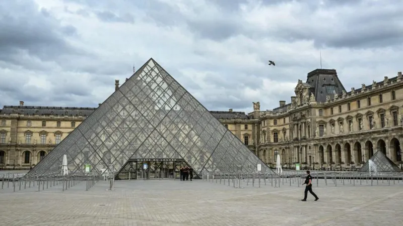 Louvre Water Leak Damages 19th Century Painting in Paris Museum A water leak at the Louvre Museum in Paris has caused damage to a 19th Century ceiling painting, marking the latest setback for the iconic museum. Leak Discovered in Duchâtel Room The leak occurred late Thursday night in room 707, also known as the "Duchâtel" room. This room houses multiple 15th and 16th Century artworks. Museum officials said the leak came from a heating pipe and was stopped shortly after midnight. Only one painting was damaged: Charles Meynier’s The Apotheosis of Poussin, Le Sueur and Le Brun, painted in 1822. The ceiling artwork depicts renowned French painters Nicolas Poussin, Eustache Le Sueur, and Charles Le Brun among angelic clouds. Immediate Response and Inspection Firefighters responded promptly, stopping the leak 40 minutes after it started. On Friday morning, a painting restorer inspected Meynier’s ceiling piece and reported two tears in the same area. The paint layer on the ceiling and arches had lifted. The Louvre confirmed that rooms 706, 707, and 708 in the Denon wing were temporarily closed but are expected to reopen later in the day. The chief architect of historic monuments assessed the ceiling and found no structural damage. Scaffolding has been erected for safety and restoration work. Recent Challenges at the Museum This incident follows several recent problems at the Louvre. Last December, 300–400 items, mostly books, were damaged by a leak in the Egyptian department. Earlier, structural weaknesses led to a partial closure of a gallery hosting Greek vases. In October, a high-profile heist saw burglars steal historic French crown jewels worth €88 million. The thieves used a vehicle-mounted lift to access the Galerie d'Apollon via a balcony near the Seine. Many stolen pieces remain unrecovered, prompting the museum to move some of its most valuable jewels to the Bank of France. France’s public audit body also criticized the museum for excessive spending on artwork at the expense of building maintenance. Louvre Faces Growing Scrutiny Museum officials now face increasing scrutiny over safety and security. A union representative confirmed that restoration work on Meynier’s ceiling painting is ongoing, but the full cost of repairs has not yet been disclosed. The Louvre remains the world’s most visited museum, attracting millions of tourists each year. However, these repeated incidents have raised questions about the management and maintenance of its historic collection.