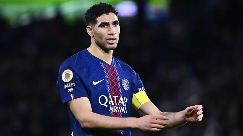 Hakimi Accused of Rape Paris St-Germain defender Achraf Hakimi will go on trial after a woman accused him of raping her at his home in Paris in 2023. She was 24 at the time. Hakimi denies the allegations. The public prosecutor’s office in Nanterre, a suburb of western Paris, started an investigation in March 2023. Hakimi wrote on X, "Today, a rape accusation is enough to justify a trial. This is as unfair to the innocent as it is to genuine victims. I calmly await this trial so the truth can come out." Lawyer Confirms Trial Hakimi’s lawyer confirmed that a trial has been officially ordered. He said, "We await this trial with determination so that justice may be served." No date has been set yet. The Nanterre prosecutor’s office has not commented further. Hakimi’s Career Highlights Born in Spain but playing for Morocco, Hakimi has made 194 appearances for Paris St-Germain. He helped PSG win Ligue 1 and the Champions League last season. Despite the ongoing case, he is included in PSG’s squad for their upcoming Champions League second-leg match against Monaco. Hakimi was recently named in the FIFPro Men’s World Team of the Year at the Best FIFA Football Awards in Paris. Looking Ahead to the World Cup Hakimi will also represent Morocco at the World Cup this summer. Morocco will play Scotland, Haiti, and Brazil in the USA, Mexico, and Canada.